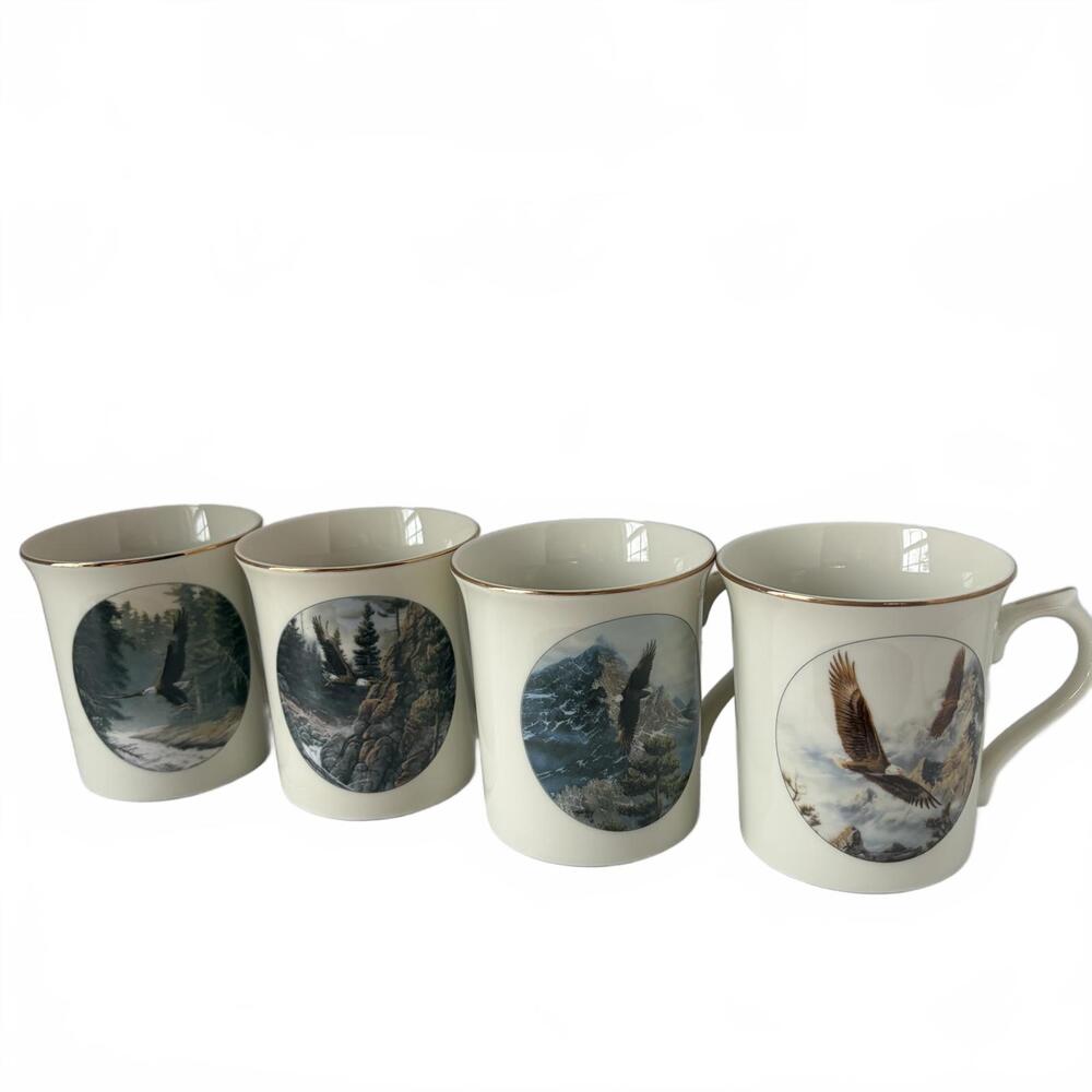 Set of four Lenox Eagle Conservation Northern Heritage porcelain mugs.